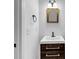 Modern bathroom with a stylish vanity, mirror, and updated lighting at 284 Due West Ct, Dallas, GA 30157