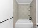 Updated bathroom featuring tiled walls and modern fixtures at 284 Due West Ct, Dallas, GA 30157