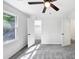 Bright bedroom features neutral walls, soft carpet, and natural light at 284 Due West Ct, Dallas, GA 30157