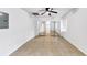 Neutral bedroom features mirrored closet doors, tile floors, and a ceiling fan at 284 Due West Ct, Dallas, GA 30157