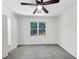 Bedroom features open door to a bathroom and view to the outside at 284 Due West Ct, Dallas, GA 30157
