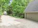 A long driveway providing ample parking space, leading to the garage at 284 Due West Ct, Dallas, GA 30157