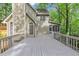 Rear exterior with deck, multiple windows and access to the screened in porch at 284 Due West Ct, Dallas, GA 30157