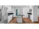 Bright kitchen features stainless steel appliances, granite countertops, and hardwood floors at 284 Due West Ct, Dallas, GA 30157