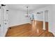 Spacious living room with hardwood floors, elegant columns, and natural light at 284 Due West Ct, Dallas, GA 30157