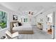 Spacious primary bedroom with tray ceiling, ceiling fan, and lots of natural light at 284 Due West Ct, Dallas, GA 30157
