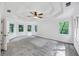 Spacious primary bedroom with tray ceiling and large windows at 284 Due West Ct, Dallas, GA 30157
