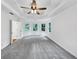 Spacious primary bedroom with tray ceiling and lots of natural light at 284 Due West Ct, Dallas, GA 30157