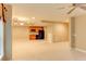 Finished basement area with kitchenette, ideal for entertaining or in-law suite at 7520 Ledgewood Way, Suwanee, GA 30024