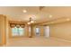 Spacious basement area with neutral carpet and lighting, ideal for recreation at 7520 Ledgewood Way, Suwanee, GA 30024