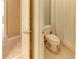 Bathroom featuring a toilet and shower with tile flooring at 7520 Ledgewood Way, Suwanee, GA 30024