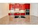 The large kitchen features a sizable island with granite countertops and a sink at 7520 Ledgewood Way, Suwanee, GA 30024
