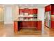 Kitchen with large island, stainless steel appliances and plentiful cabinetry at 7520 Ledgewood Way, Suwanee, GA 30024