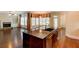 View from the kitchen to the living room and breakfast nook at 7520 Ledgewood Way, Suwanee, GA 30024