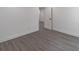 Basement space featuring gray flooring, and neutral walls with a view into the hallway at 2265 Hillbriar Dr, Buford, GA 30518