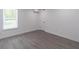 Finished basement has gray flooring, bright window, and door at 2265 Hillbriar Dr, Buford, GA 30518