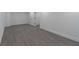 Finished basement with gray flooring, and neutral walls at 2265 Hillbriar Dr, Buford, GA 30518
