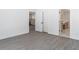 Interior view shows bedroom with doorways to the kitchen and bathroom at 2265 Hillbriar Dr, Buford, GA 30518