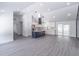 Open-concept kitchen features an island, stainless steel appliances, and plenty of counter space at 2265 Hillbriar Dr, Buford, GA 30518