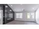 Bright living space with an electric fireplace and french doors at 2265 Hillbriar Dr, Buford, GA 30518