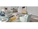 Open-concept living room connects kitchen and dining area, great for entertaining at 2348 Argento Cir, Dacula, GA 30019