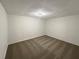 Finished basement with carpet and lighting at 3458 Natalie Ct, Loganville, GA 30052