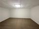 Finished basement with carpet and drop ceiling at 3458 Natalie Ct, Loganville, GA 30052