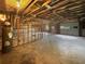 Unfinished basement with exposed ceiling, concrete floor, and framed walls ready for customization at 3458 Natalie Ct, Loganville, GA 30052