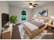 Staged bedroom featuring a large window, plush bedding, and modern decor at 3458 Natalie Ct, Loganville, GA 30052
