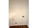 A small room with wood floors and a shelf for storage at 3458 Natalie Ct, Loganville, GA 30052