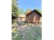 Exterior view of the back of the home, showcasing the deck and backyard at 107 Honeysuckle Ln, Stockbridge, GA 30281