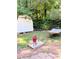 Backyard with a storage shed, hammock, and grill at 107 Honeysuckle Ln, Stockbridge, GA 30281