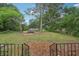 Expansive backyard featuring lush greenery and a serene setting at 1340 Juneau Ct, Tucker, GA 30084