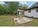 Beautiful backyard with a fountain and covered porch, perfect for outdoor relaxation at 1340 Juneau Ct, Tucker, GA 30084