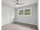 Bright bedroom with ample natural light, hardwood floors, and a ceiling fan at 1340 Juneau Ct, Tucker, GA 30084
