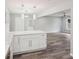 Open-concept kitchen and living area with modern finishes and hardwood flooring at 1340 Juneau Ct, Tucker, GA 30084