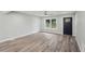 Spacious open-concept living room with hardwood floors and lots of natural light at 1340 Juneau Ct, Tucker, GA 30084