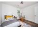 Cozy bedroom with natural light, modern furniture, and hardwood floors at 1678 Capistrana Pl, Decatur, GA 30032