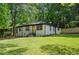 Charming one-story home with freshly manicured lawn and inviting front entrance at 1678 Capistrana Pl, Decatur, GA 30032