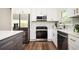 Renovated kitchen featuring stainless appliances, modern cabinets, and quartz countertops at 1678 Capistrana Pl, Decatur, GA 30032