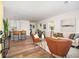 Open-concept living area featuring modern decor, hardwood floors, and plenty of natural light at 1678 Capistrana Pl, Decatur, GA 30032