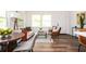 Bright, open living space featuring hardwood floors, stylish decor, and plenty of natural light at 1678 Capistrana Pl, Decatur, GA 30032