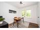 Well-lit office features wood floors, white paneled walls, and modern décor at 1678 Capistrana Pl, Decatur, GA 30032