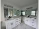 Modern bathroom with double vanity, sleek fixtures, and large mirrors, offering a luxurious and functional space at 3050 Camden Way, Alpharetta, GA 30005