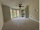 Bright bedroom with a large window offering natural light and a spacious closet with built-in shelves at 3050 Camden Way, Alpharetta, GA 30005