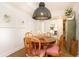 Dining area with view to bedroom, hardwood floors and statement lighting at 35 Sheridan Ne Dr # 7, Atlanta, GA 30305