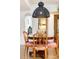 Inviting dining room with round table, four chairs, decorative lighting, and hardwood floors at 35 Sheridan Ne Dr # 7, Atlanta, GA 30305