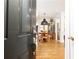 Inviting entryway showcases hardwood floors and a dining area with statement lighting at 35 Sheridan Ne Dr # 7, Atlanta, GA 30305