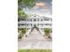 Beautiful white building with black shutters and professionally landscaped front yard at 35 Sheridan Ne Dr # 7, Atlanta, GA 30305