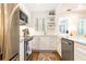 Modern kitchen featuring white cabinets, stainless steel appliances, and subway tile backsplash at 35 Sheridan Ne Dr # 7, Atlanta, GA 30305